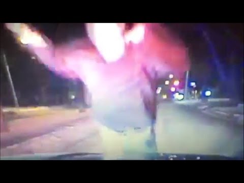 Dashcam Captures Man Belly Flopping Onto Cop Automobile After Charging Automobile