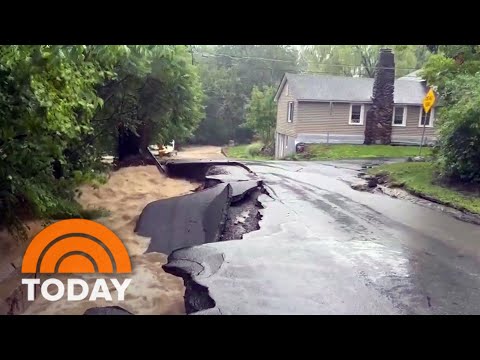 Northeast flooding washes away vehicles, collapses roads