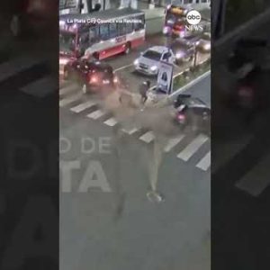 Lady crossing the avenue narrowly avoids two-automobile collision | ABC News