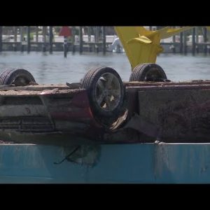 Sunken Vehicles From Typhoon Ian Pulled Out of Water