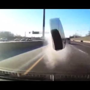 Tire Bursts By Car Window on Highway