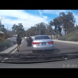 Look The Weird Moment a Woman Walks Out of Her Moving Automobile